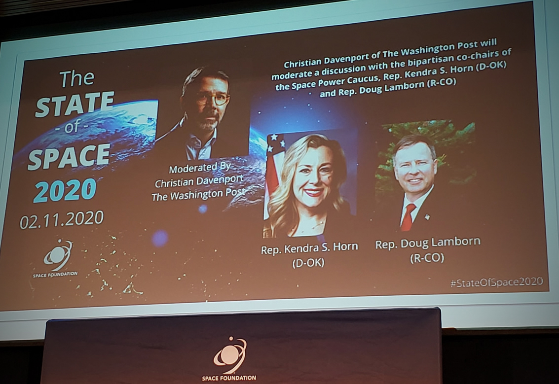 A projected screen highlighting members of the Congressional panel
